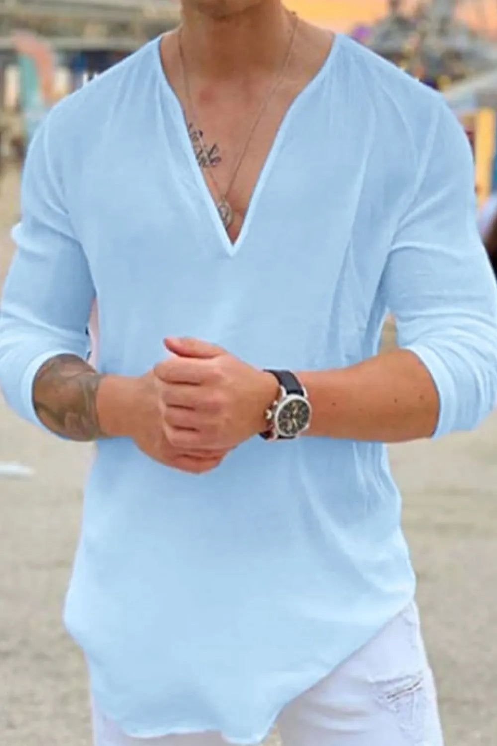 Men's full size V-neck long sleeve top in light blue, slightly stretchy, 100% cotton.