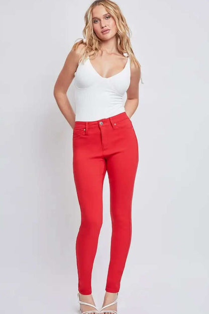 YMI Jeanswear Hyperstretch Mid-Rise Skinny Jeans in red, featuring a sleek fit and modern silhouette.