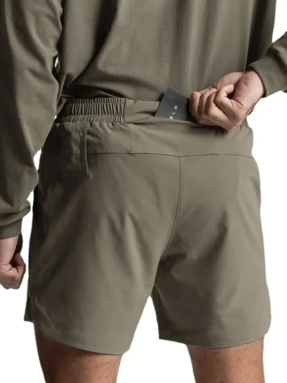 Men's elastic waist active shorts in olive green, polyester, with moderate stretch.
