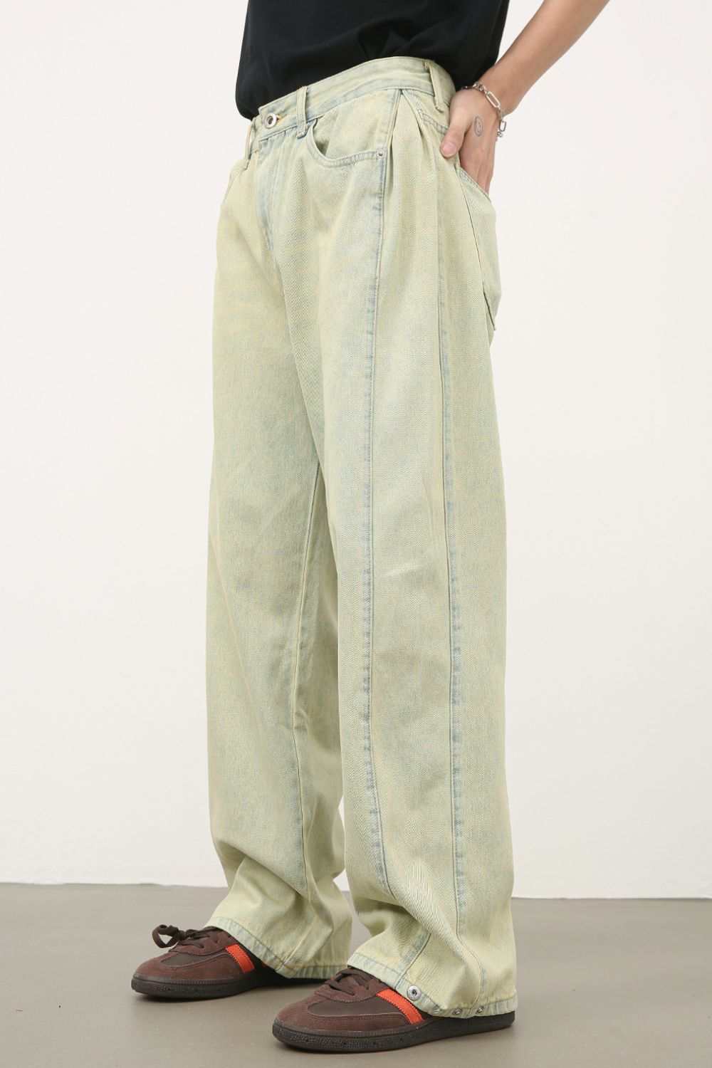 Men's mid rise jeans with pockets, no stretch, cotton blend.