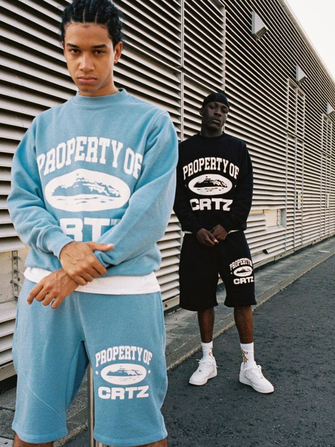 Men's letter graphic round neck sweatshirts in blue and black, slightly stretchy polyester-cotton blend, basic style.