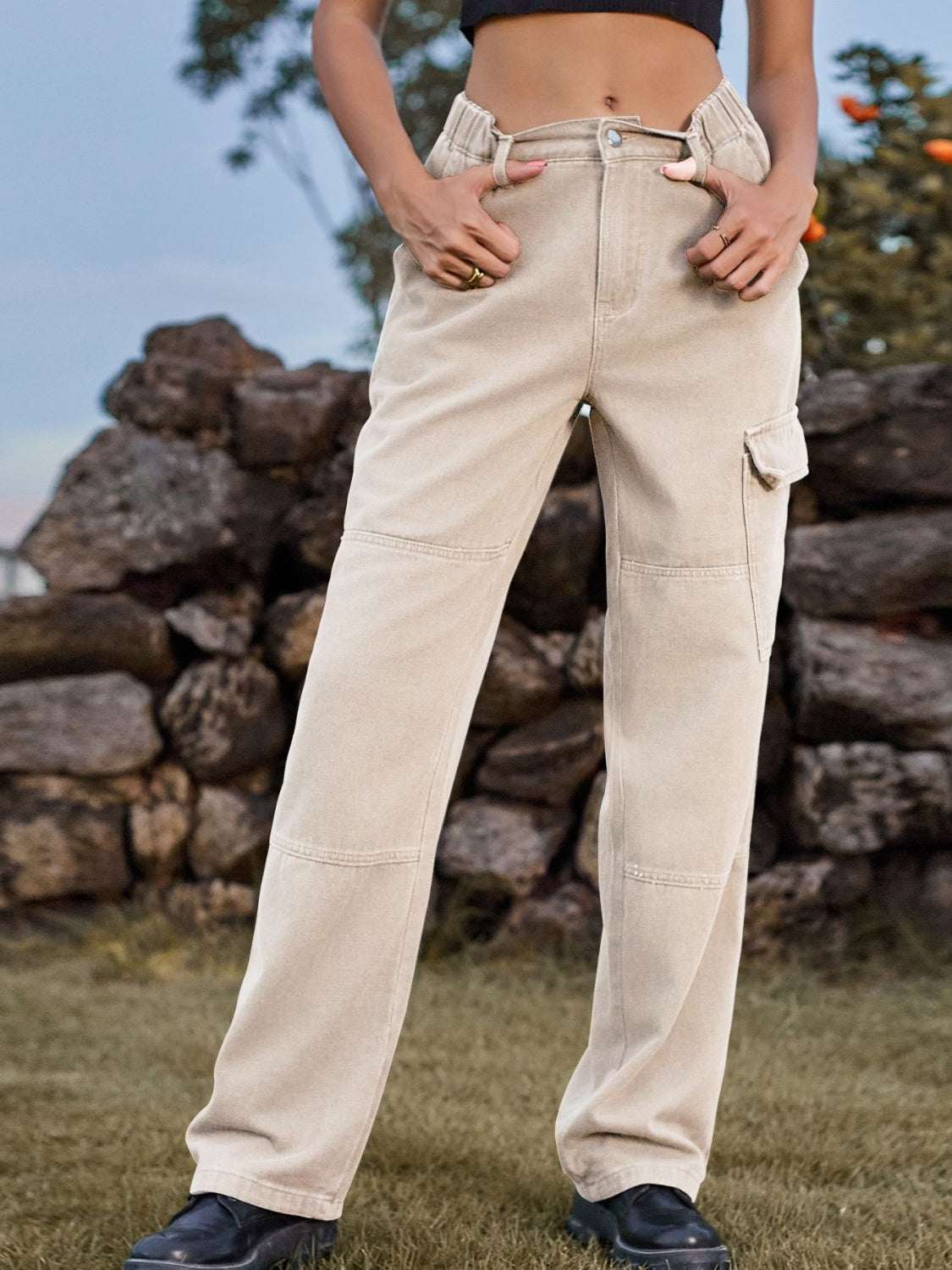 High Waist Cargo Straight Jeans with pockets, non-stretch rayon material, outdoor setting.