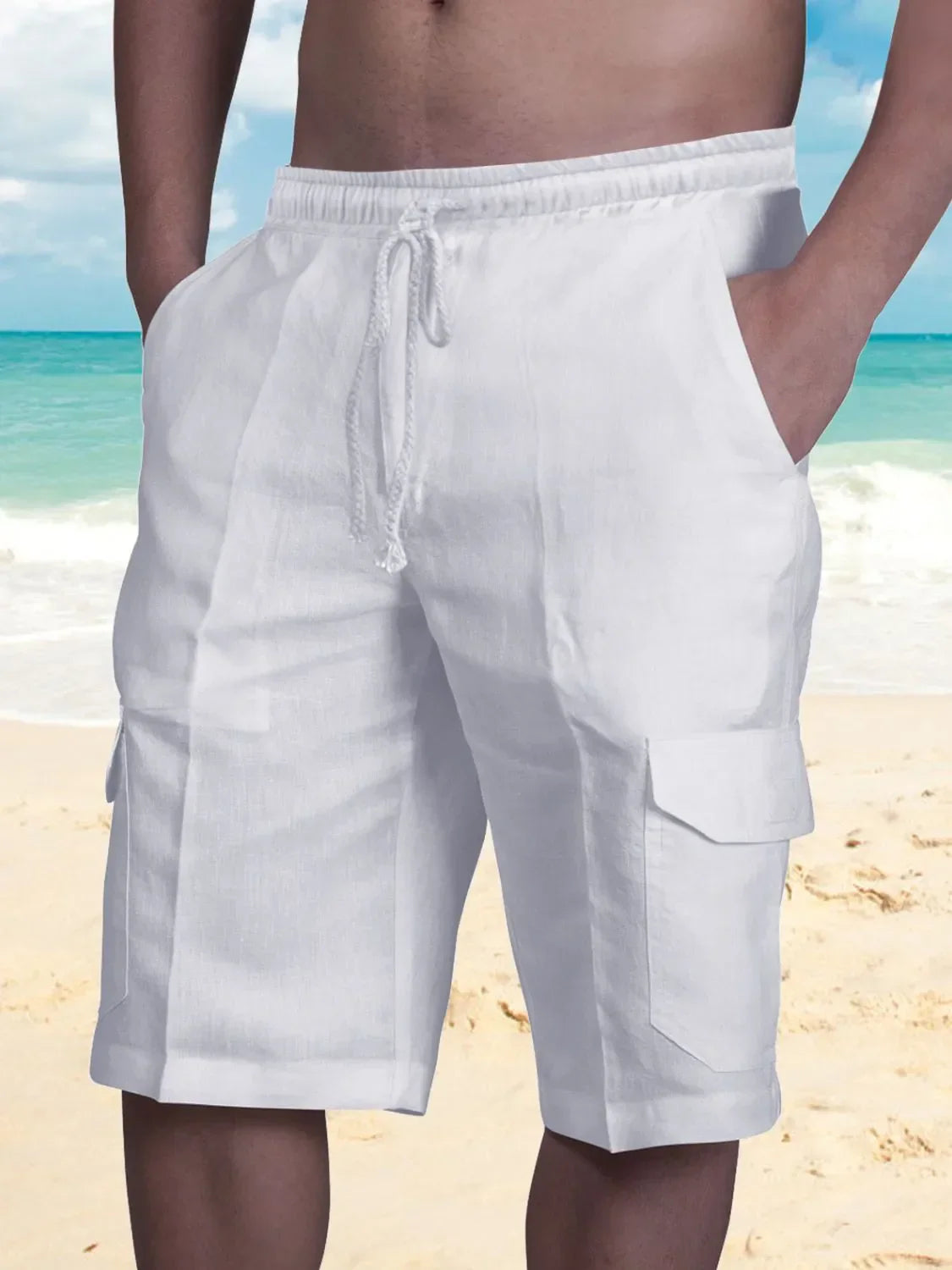 Men's plus size drawstring pocketed shorts in white, featuring a basic style with cotton-polyester blend, perfect for a beach outing.