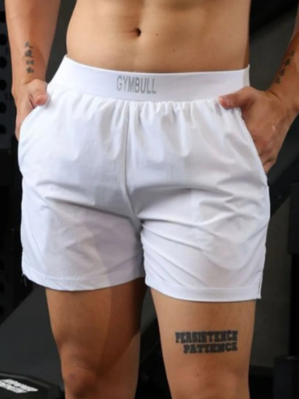 Men's plus size elastic waist shorts in white.