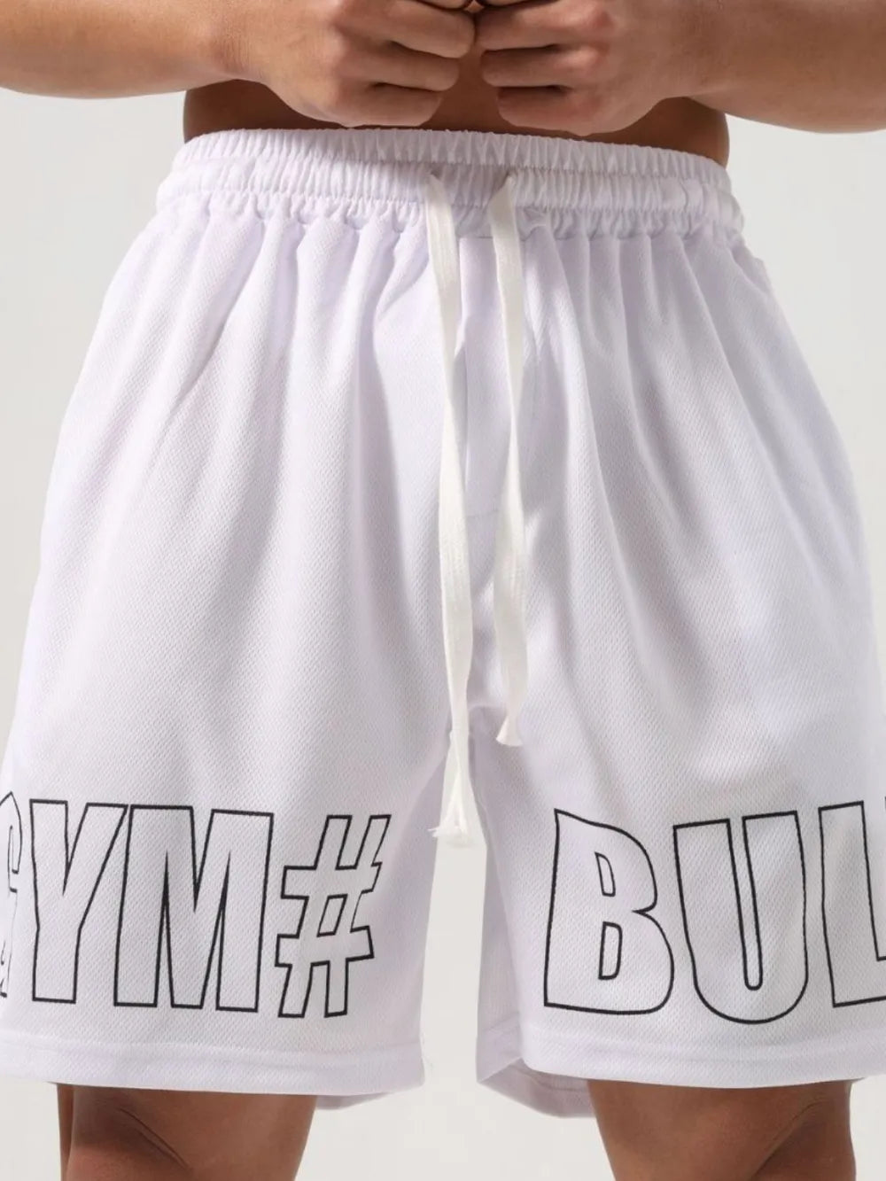 Men's plus size letter drawstring shorts, basic style, 100% polyester, white with bold letters.