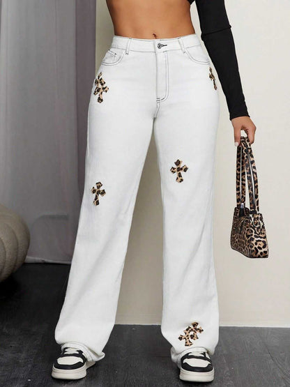 Leopard Cross Detail Straight Leg Jeans with pocketed design and button closure.
