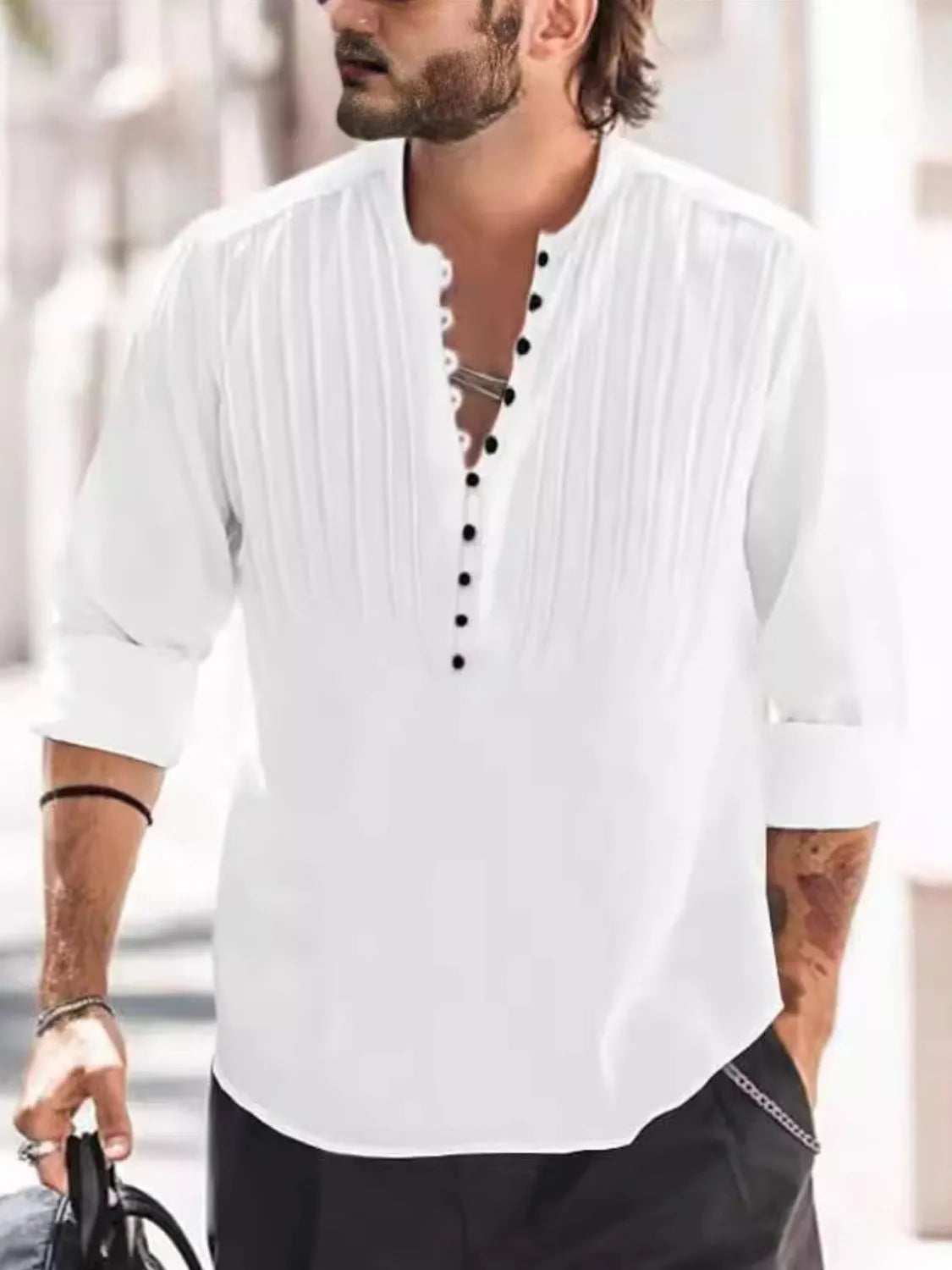 Men's plus size white long sleeve polo shirt with button detail.