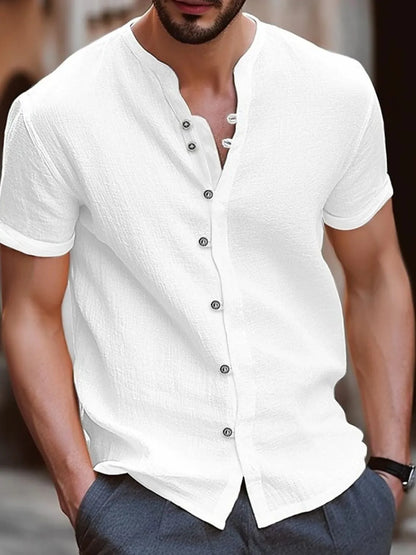 Men's full size button up short sleeve shirt in white, slightly stretchy cotton polyester blend.