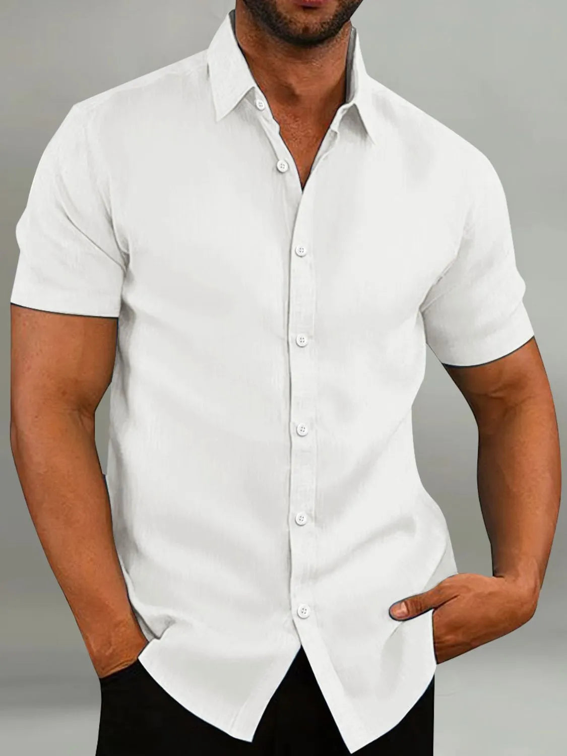 Men's full-size button-up short sleeve shirt in white, slightly stretchy cotton-poly blend.