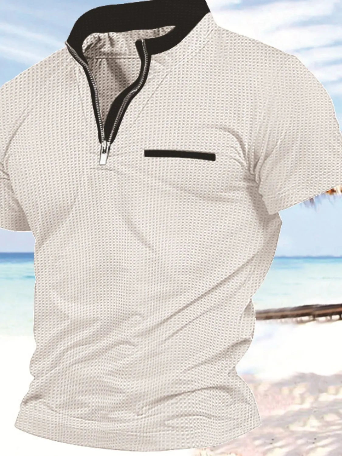 Men's full size zip collar short sleeve polo, slightly stretchy polyester-cotton blend, beach background.