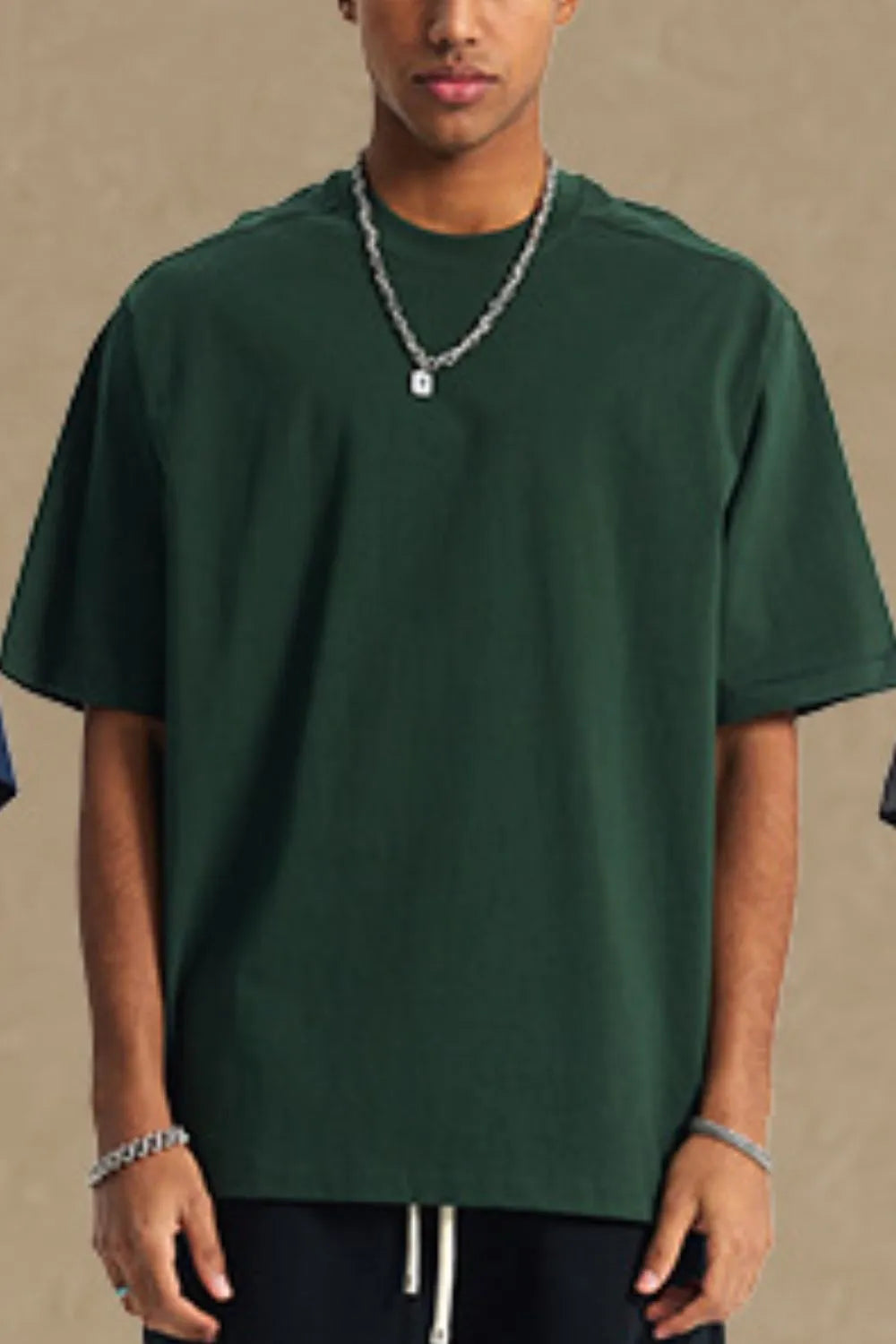 Men's round neck half sleeve t-shirt in dark green, cotton, casual fit.