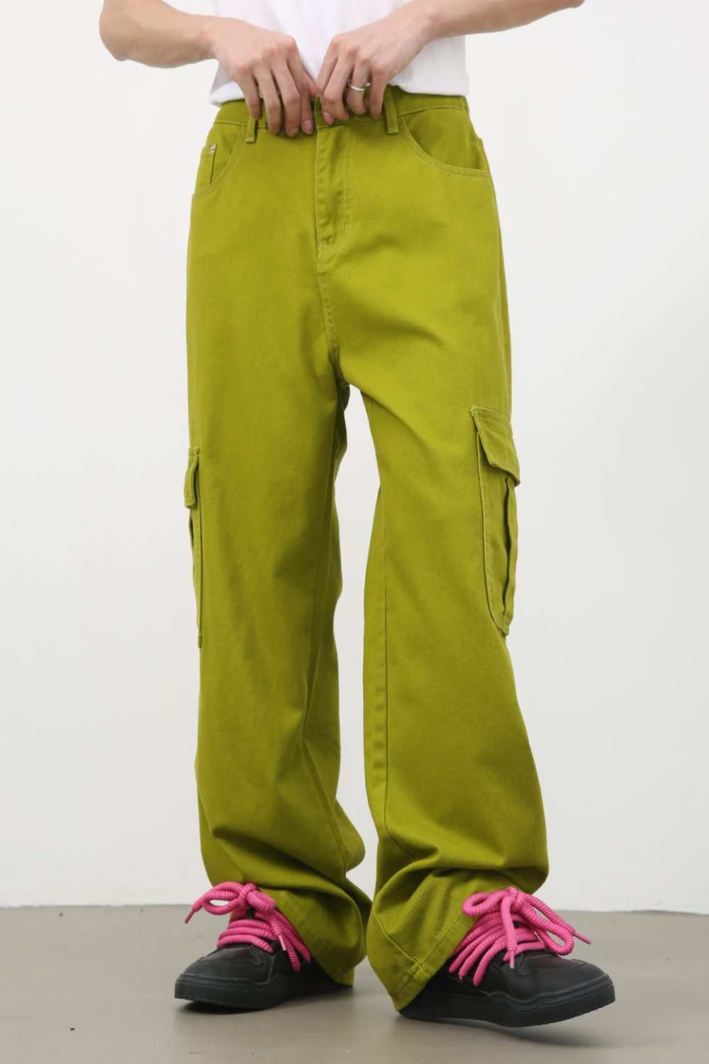 Men's mid rise jeans with cargo pockets, 100% cotton, green color, no stretch.