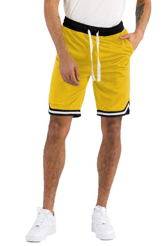 Athletic basketball sports shorts with elastic waist and drawstring.