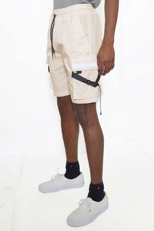 Tactical shorts with straps, reflective tape, and extra pockets.