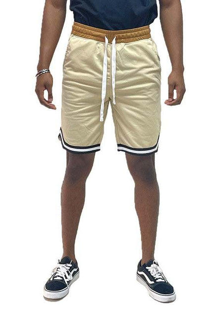 Solid athletic basketball sports shorts with elastic waist, drawstring, and pockets.