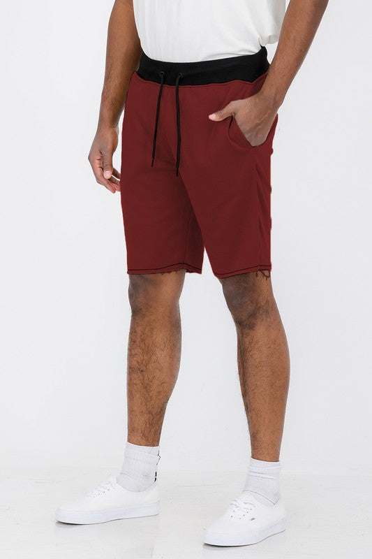 Weiv Raw Cut Sweat Shorts, regular fit, above the knee, elastic waist with drawstring, red color.