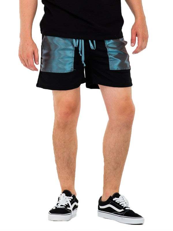 Peacock iridescent above the knee shorts with peacock cutout pockets and elastic waist.